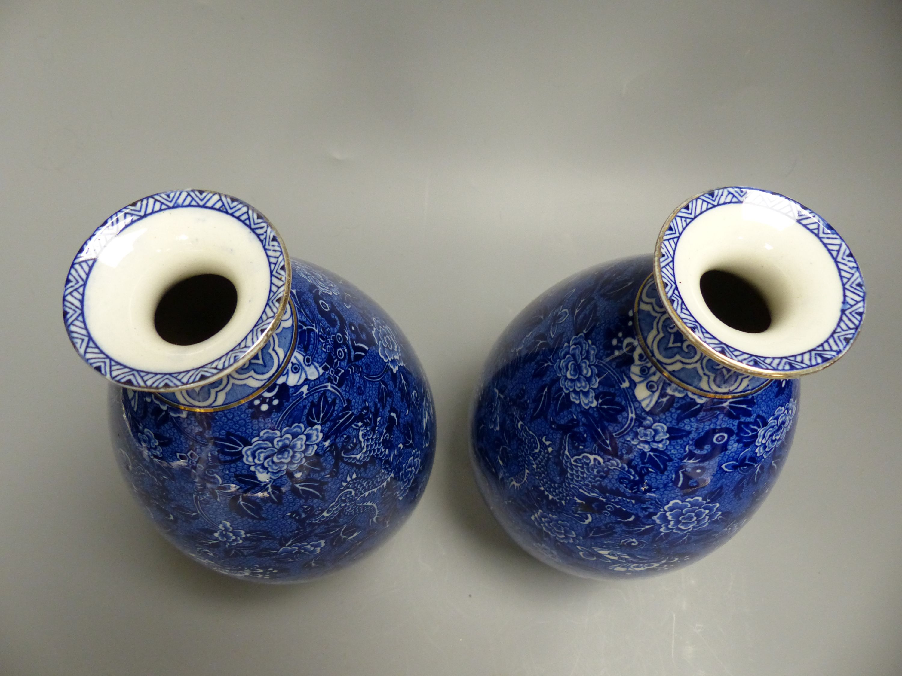 A pair of early 20th century Shelley blue printed pottery ovoid vases, height 23.5cm